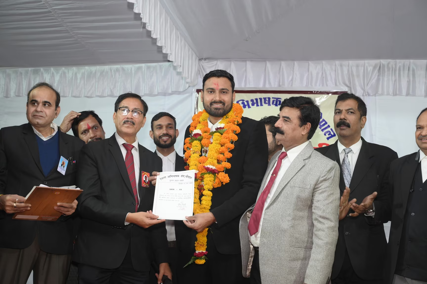Advocate Anil Jat receiving formal recognition
